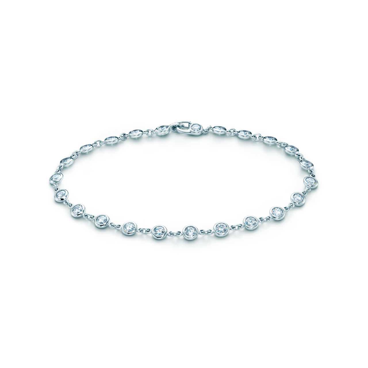 Diamonds Bracelet in PlatinumRound brilliant diamonds catch the light and make it dance in a continuous display of radiance. Designed by Elsa Peretti, this platinum bracelet reflects timeless elegance and refined simplicity. Twenty-three diamonds shi